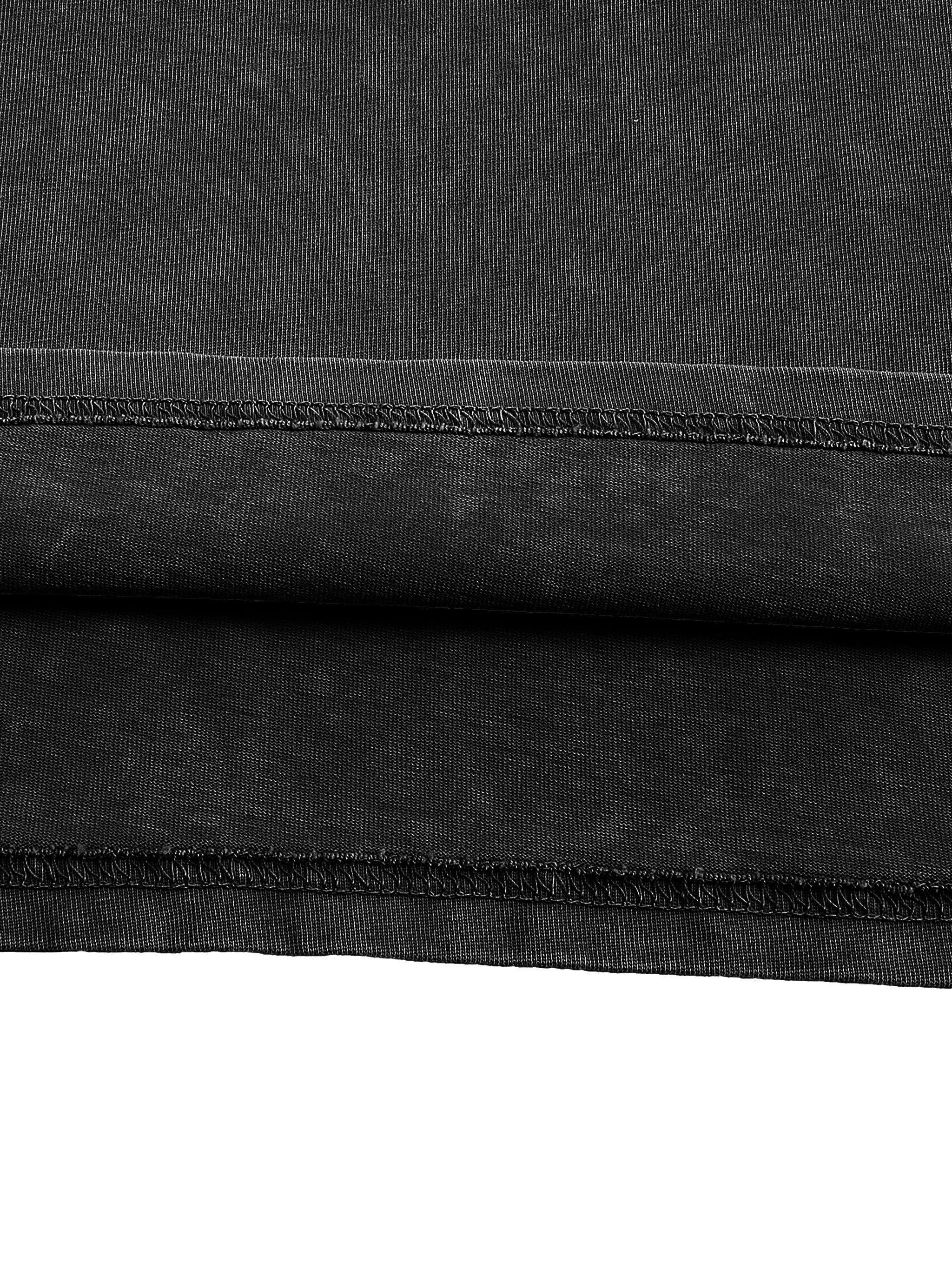 Close-up of the fabric detailing on the Dream Big Acid Wash X RisenRetro Oversized Heavyweight 240GSM T-Shirt.