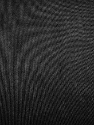 Close-up texture of fabric for Dream Big Acid Wash X RisenRetro Oversized Heavyweight 240GSM T-Shirt.