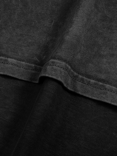 Close-up view of the fabric texture of the Dream Big Acid Wash X RisenRetro Oversized Heavyweight 240GSM T-Shirt.